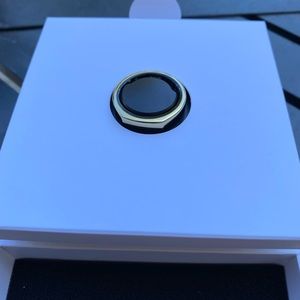 Oura Ring GEN 3 in gold, size 12, plus 6 month free premium services.
